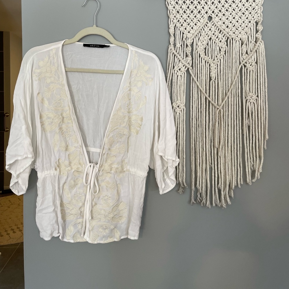 White flowy top